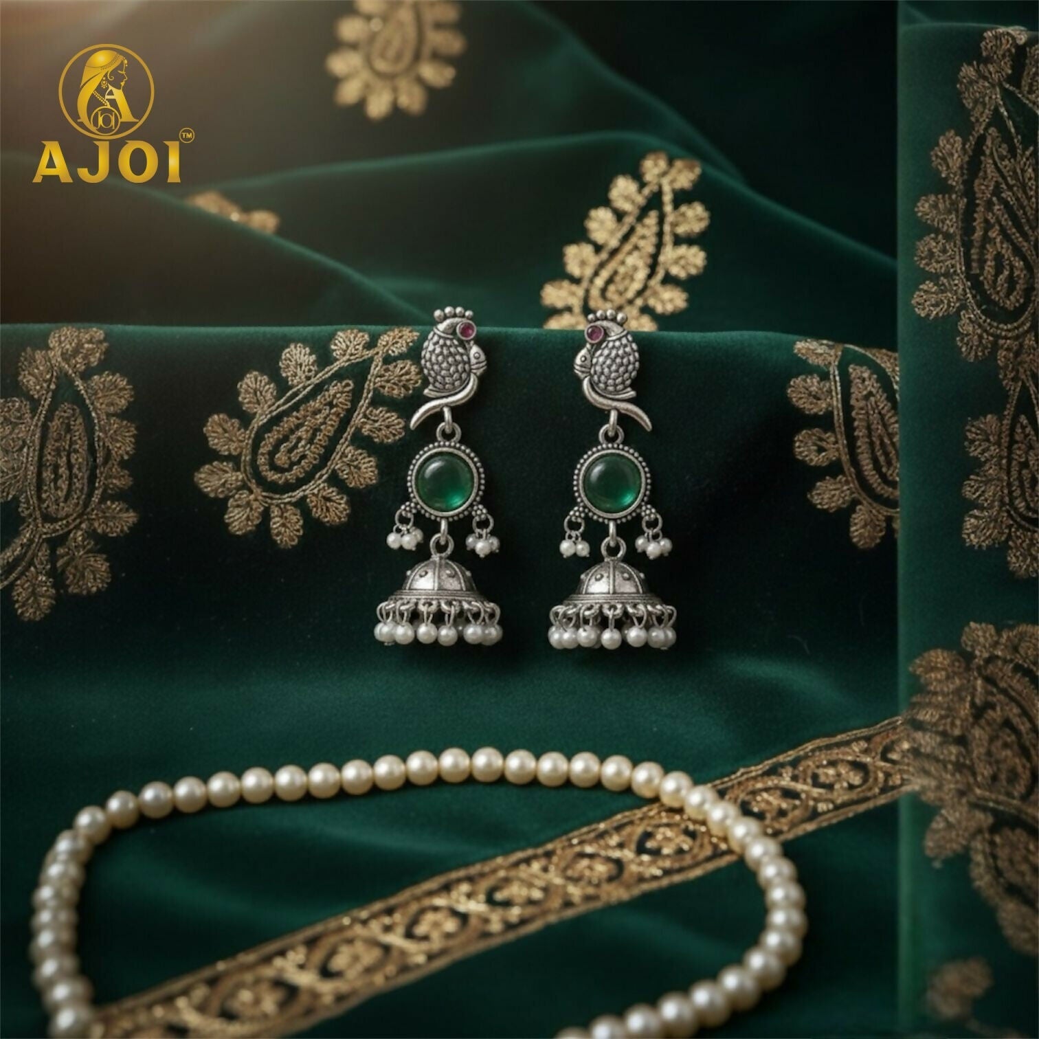 Peacock Jhumka Earrings – Antique Silver with Emerald...
