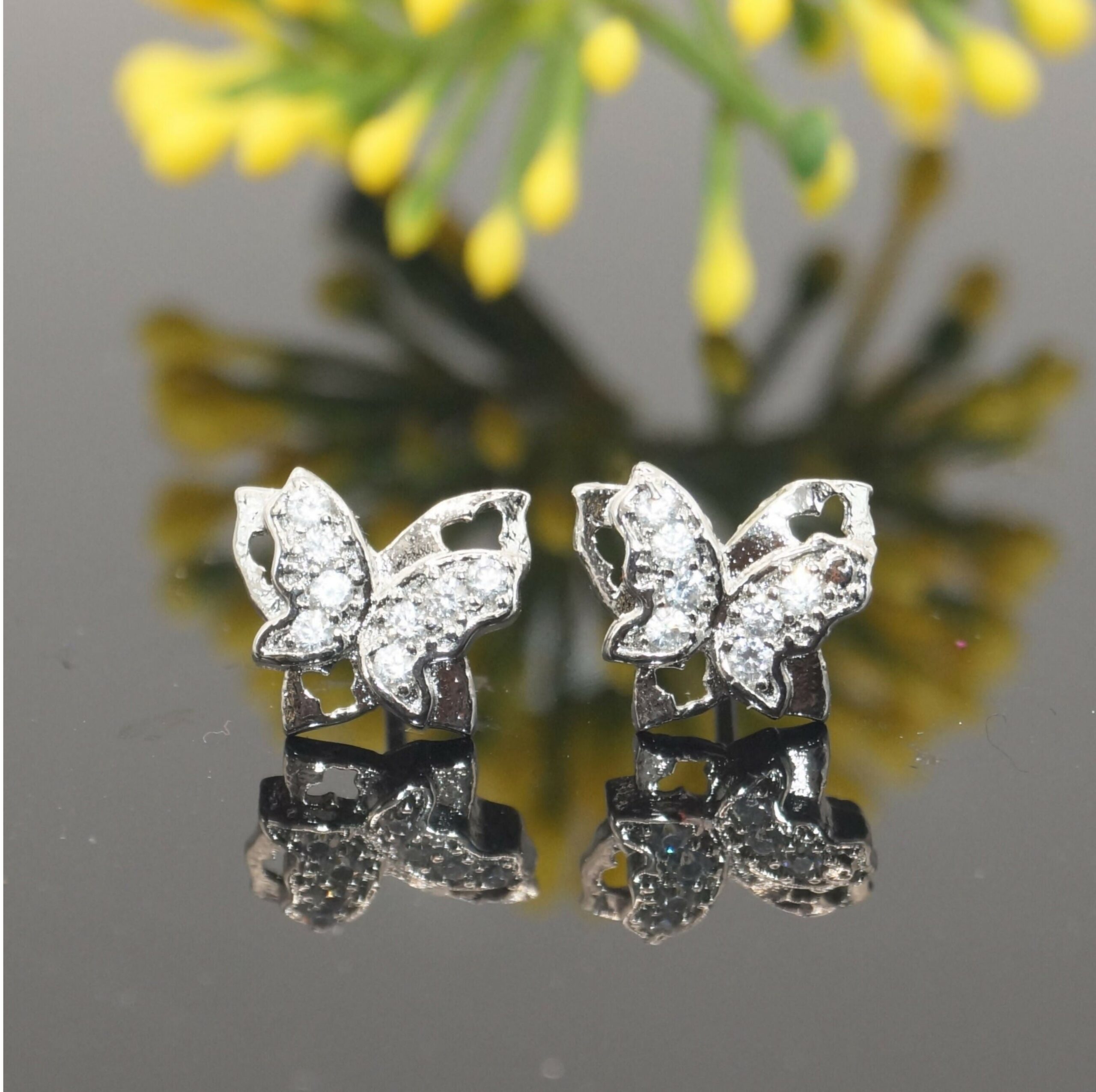Sterling Silver Butterfly Stud Earrings – Sparkling Cubic...